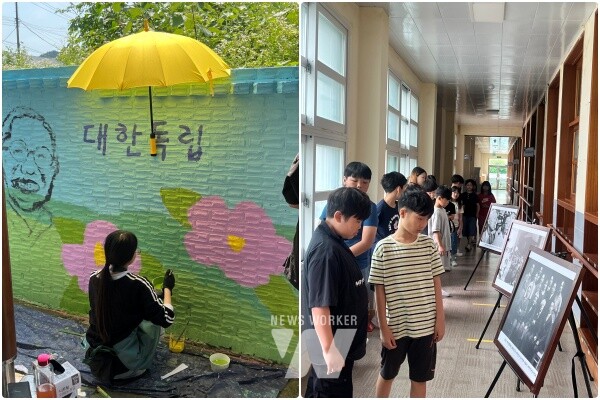 독립운동가 벽화를 그리기,학교 복도에 전시한 ‘역사의 한 장면’ 사진 전시회를 학생들이 관람하고 있다